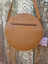 Load image into Gallery viewer, Tooled Round Cowhide Bag
